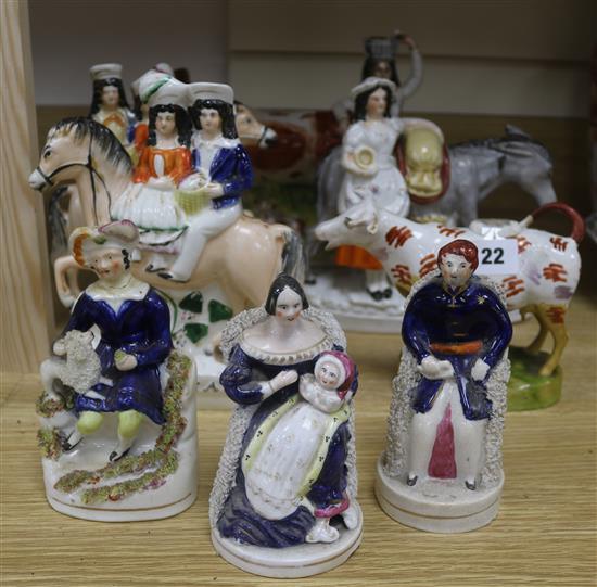 Eight Staffordshire pottery figures or groups
